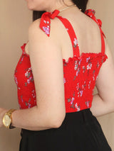 TOP MULTIAGUJA CON LAZOS ESTAMPADO