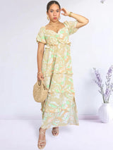 MAXIVESTIDO ESCOTE CORAZÓN CON BOBOS ESTAMPADO BEIGE