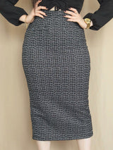 FALDA MIDI TWEED