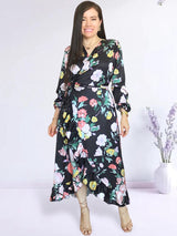 MAXIVESTIDO ENVOLVENTE CON VUELOS ESTAMPADO NEGRO