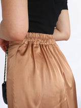 FALDA CON REGULADOR COLOR ENTERO