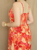 MAXIVESTIDO TIRAS CON VUELO ESPIRAL ESTAMPADO NARANJA
