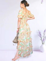 MAXIVESTIDO ESCOTE CORAZÓN CON BOBOS ESTAMPADO BEIGE